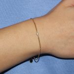 Bracciale in argento placcato oro con perla centrale